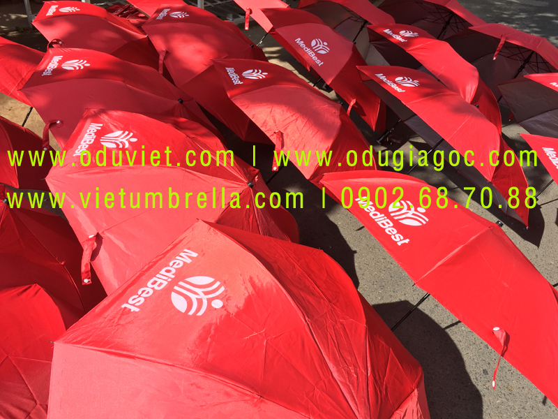 xưởng sản xuất ô dù cầm tay in logo quảng cáo